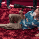 johnson on the floor with a lense.